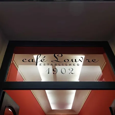 At Cafe Louvre Apartment